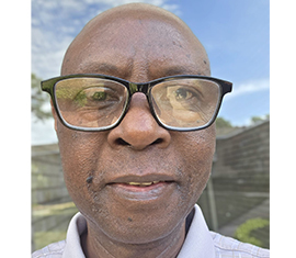 Dr Charles Birore